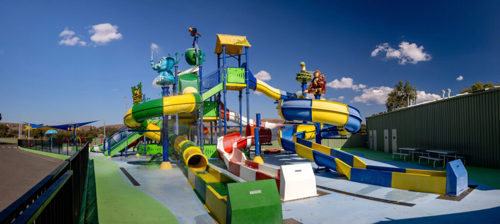 Image of child waterpark with picturesque blue skies